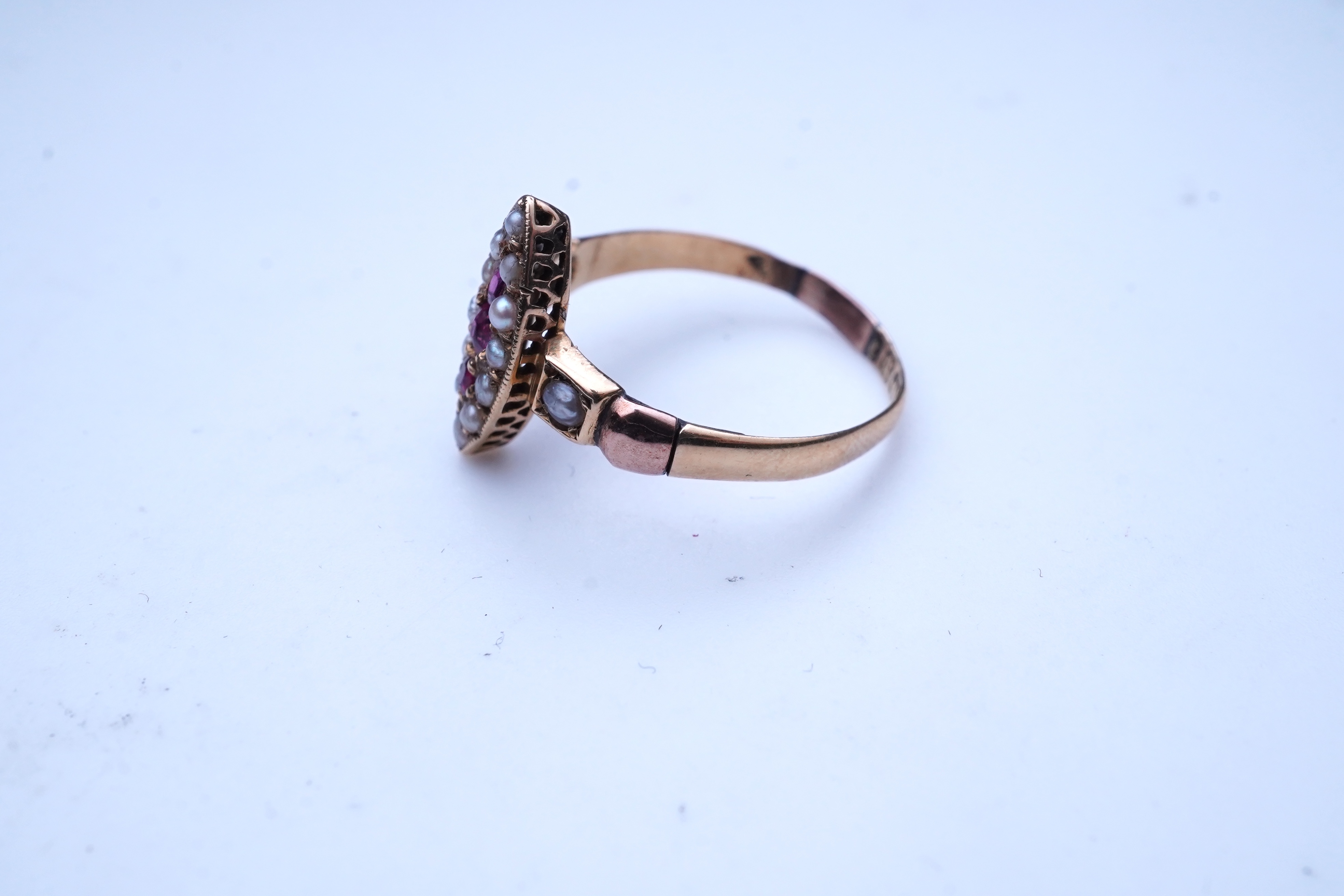A Victorian ruby and seed pearl ring, circa 1876